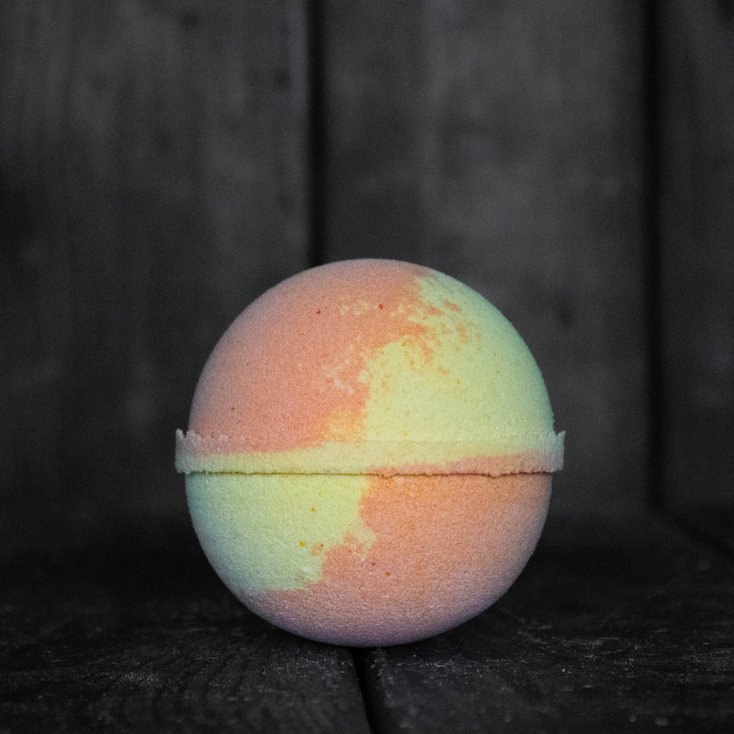 An orange and yellow bath bomb.