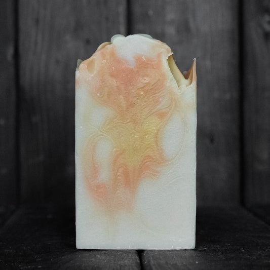Soap with orange and yellow swirls.